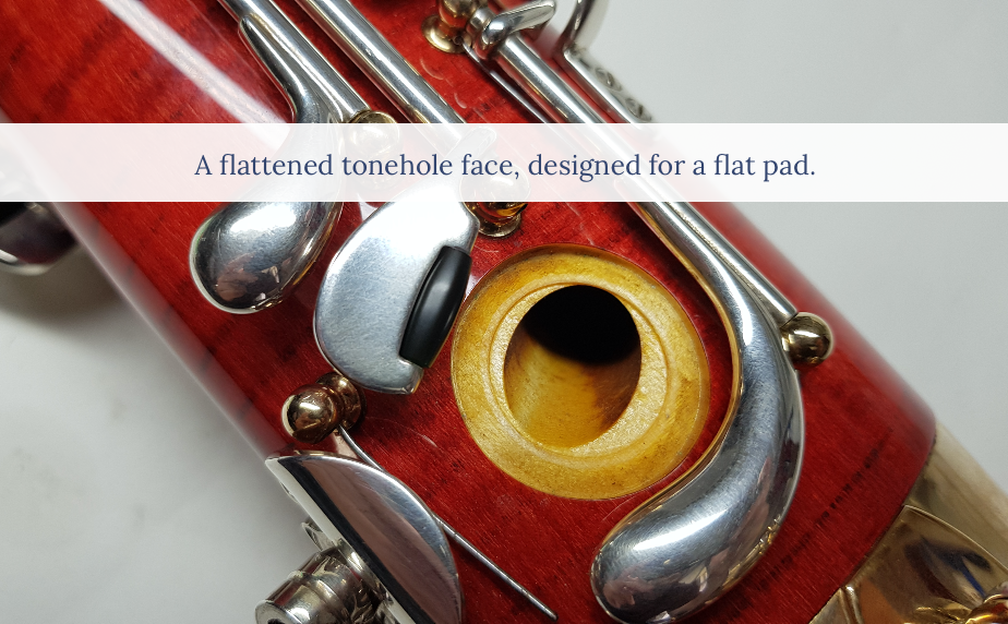 Flattened bassoon tonehole face